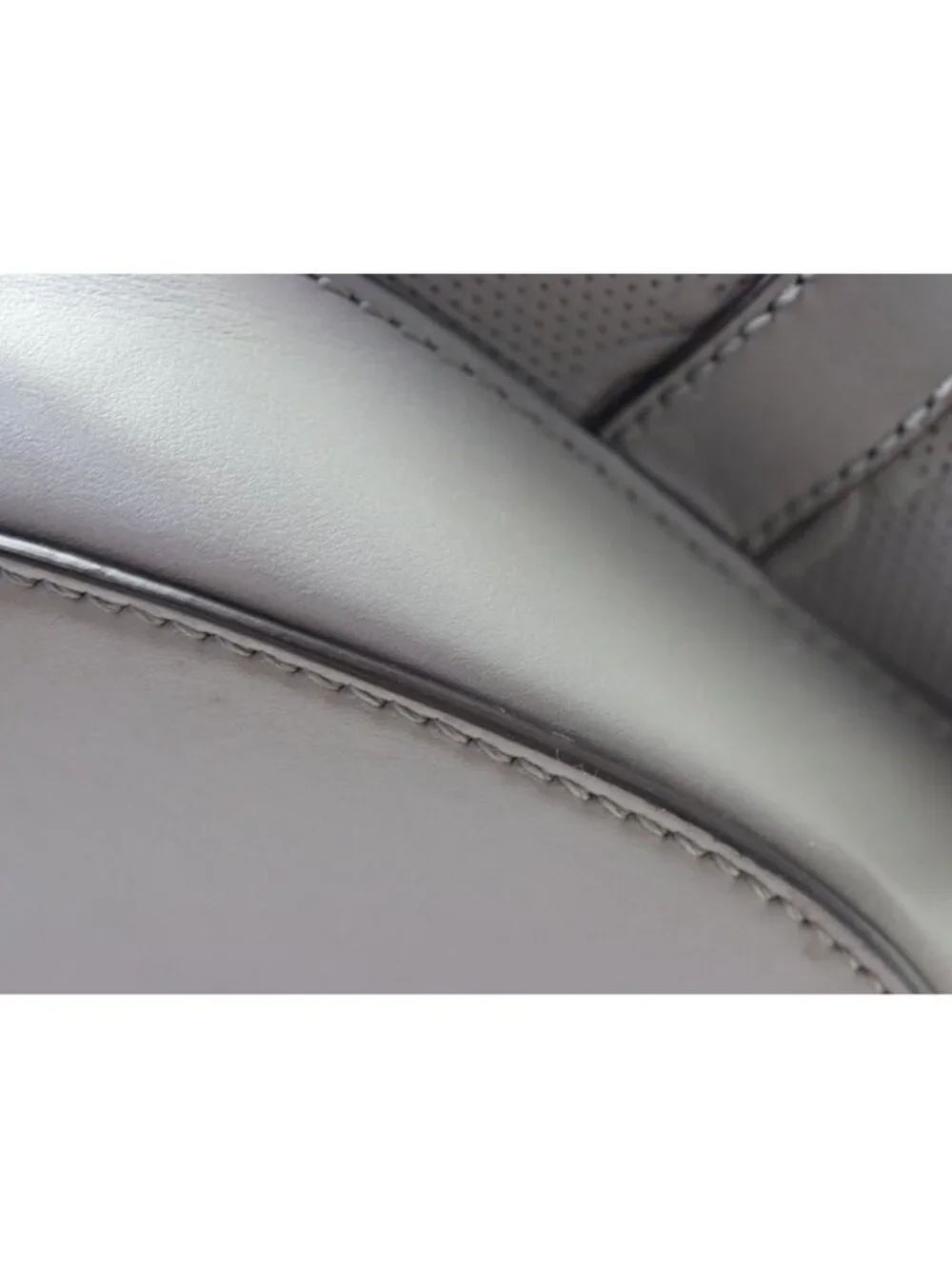 Gucci GG Embossed Leather Backpack